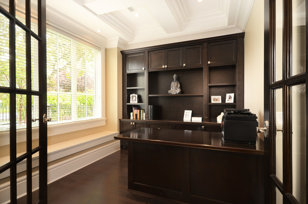 Example of a transitional home design design in Vancouver