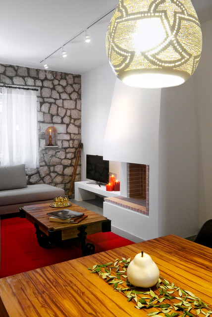 House in Paleros rustic-living-room