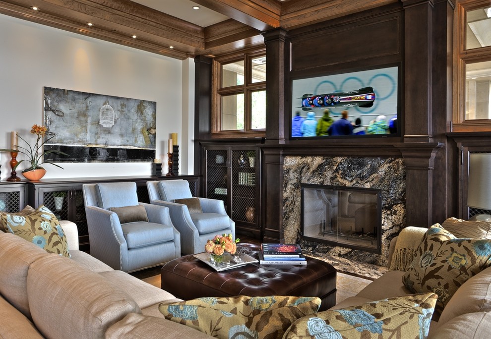 Photo of a traditional living room in Seattle with a stone fireplace surround.