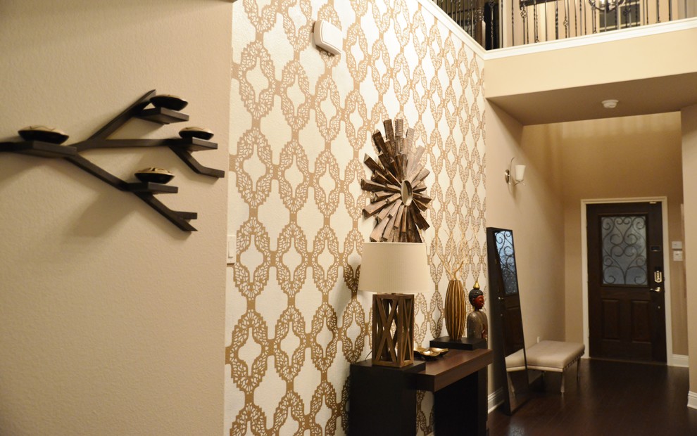 Inspiration for a large transitional dark wood floor foyer remodel in Austin with a dark wood front door and multicolored walls
