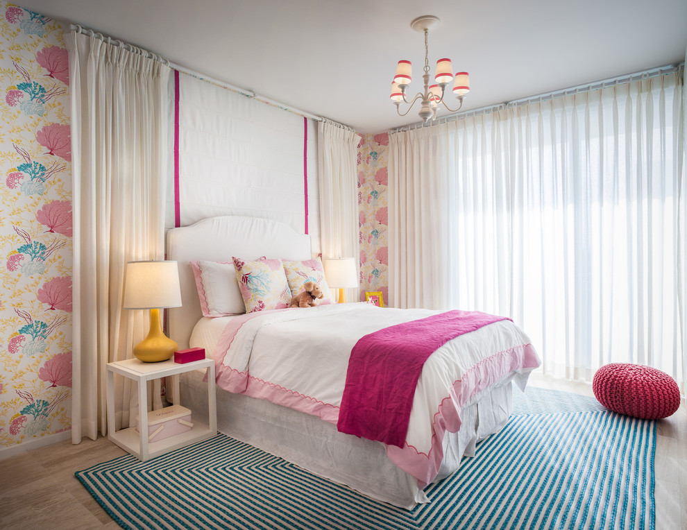 Mid-sized contemporary kids' bedroom in Miami with light hardwood floors and multi-coloured walls for kids 4-10 years old and girls.
