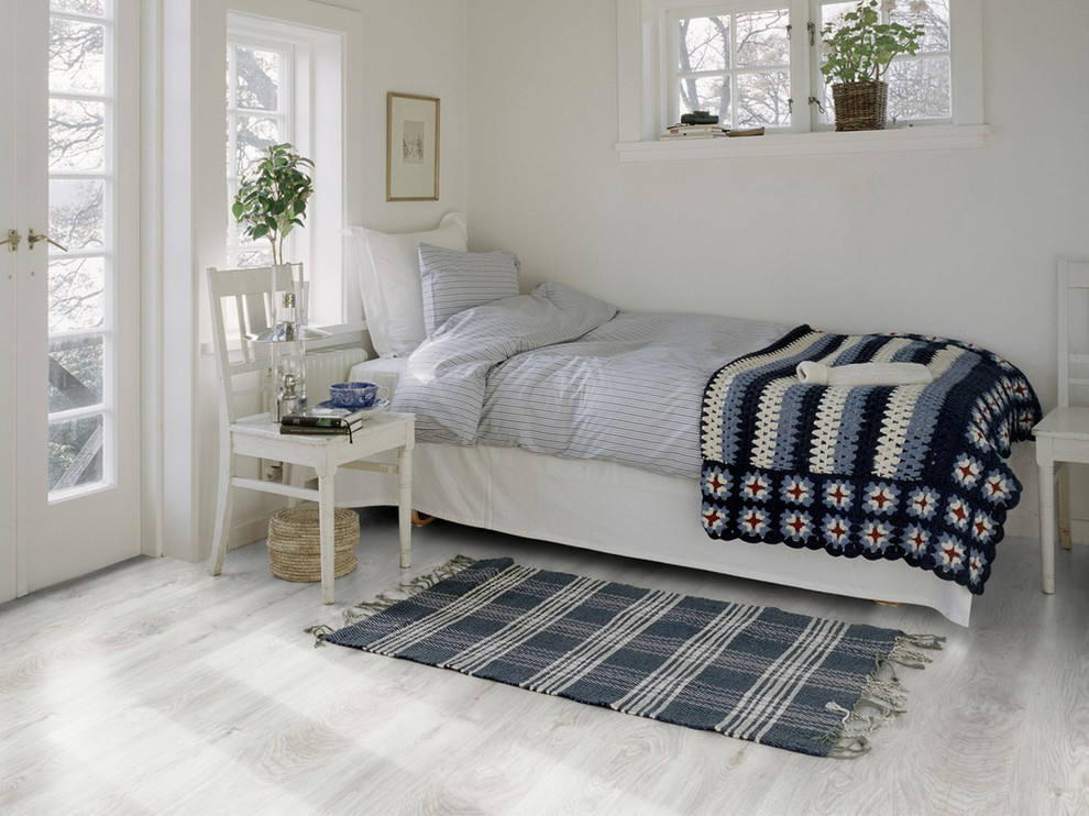 Example of a danish bedroom design in Cleveland