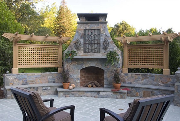 Patio - large traditional backyard stone patio idea in Atlanta with a fire pit and no cover