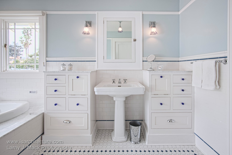 Design ideas for an arts and crafts bathroom in San Diego with raised-panel cabinets, white cabinets, marble benchtops, a drop-in tub, white tile, subway tile, blue walls and mosaic tile floors.