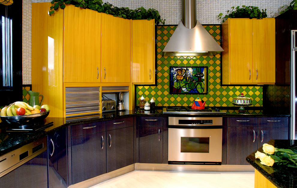 Photo of a mid-sized contemporary l-shaped eat-in kitchen in Chicago with an undermount sink, flat-panel cabinets, yellow cabinets, multi-coloured splashback, porcelain splashback, stainless steel appliances, light hardwood floors and with island.