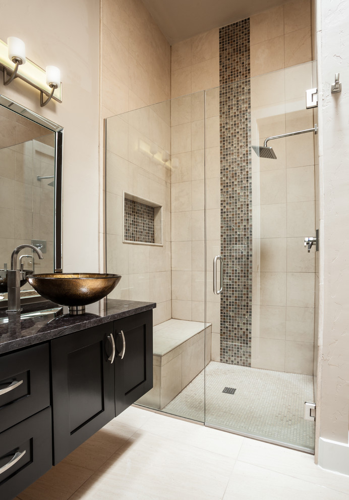 Photo of a contemporary bathroom in Austin with a vessel sink, shaker cabinets, black cabinets, a curbless shower, beige tile, beige walls, a niche and a shower seat.