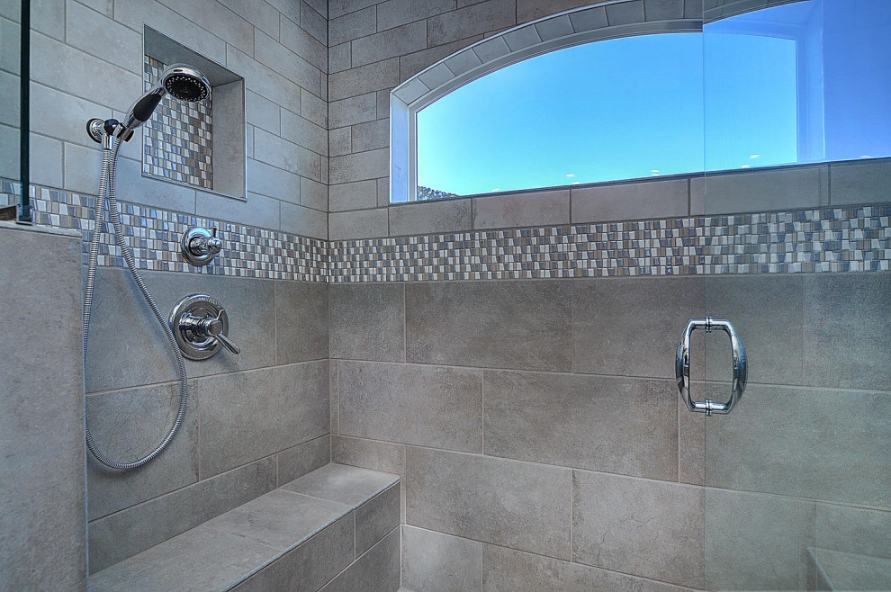 Example of a mountain style home design design in Denver