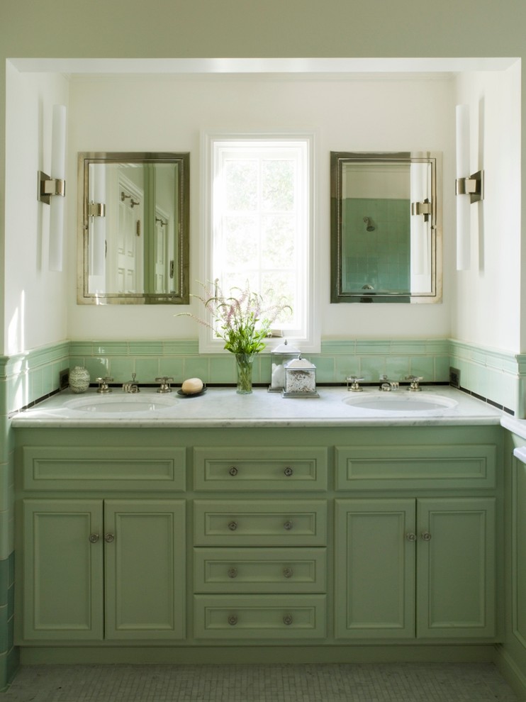 Design ideas for a mid-sized mediterranean master bathroom in San Francisco with an undermount sink, beaded inset cabinets, green cabinets, marble benchtops, a drop-in tub, an alcove shower, a one-piece toilet, white tile, mosaic tile, white walls and mosaic tile floors.