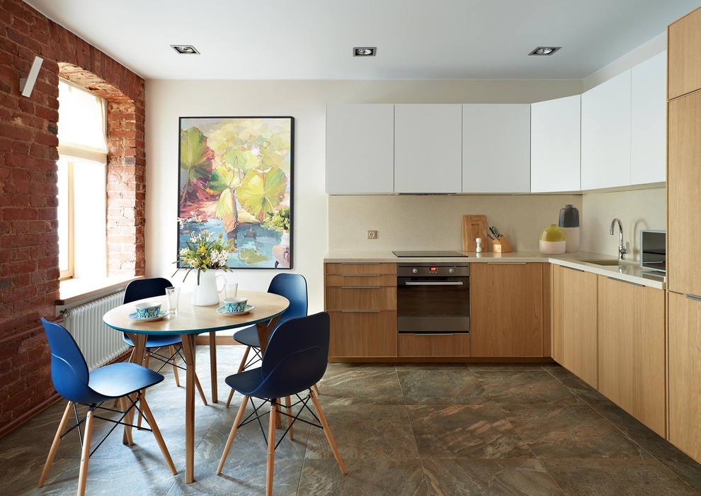 Photo of a mid-sized contemporary l-shaped eat-in kitchen in Moscow with a single-bowl sink, flat-panel cabinets, white cabinets, beige splashback, stainless steel appliances and no island.