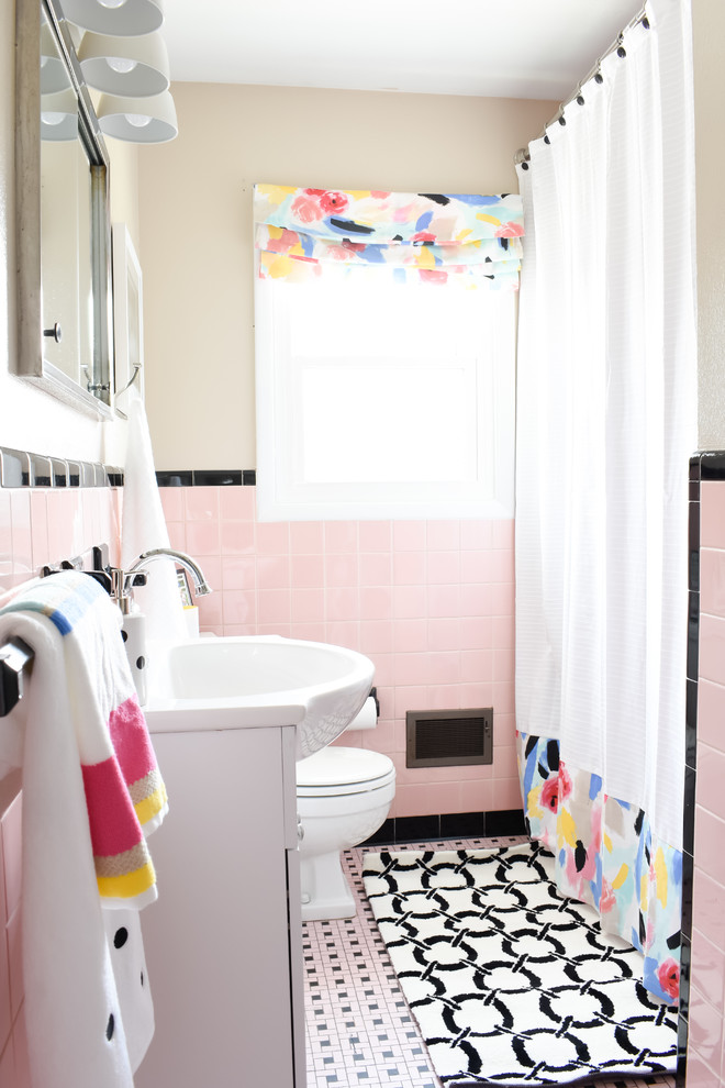 Mid-sized midcentury kids bathroom in Nashville with a drop-in tub, beige tile, ceramic tile, pink walls, ceramic floors and pink floor.