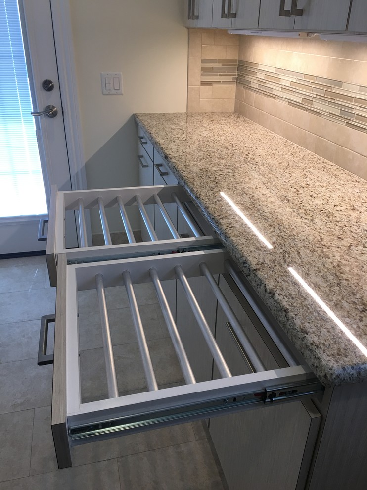 Inspiration for a modern laundry room remodel in New York