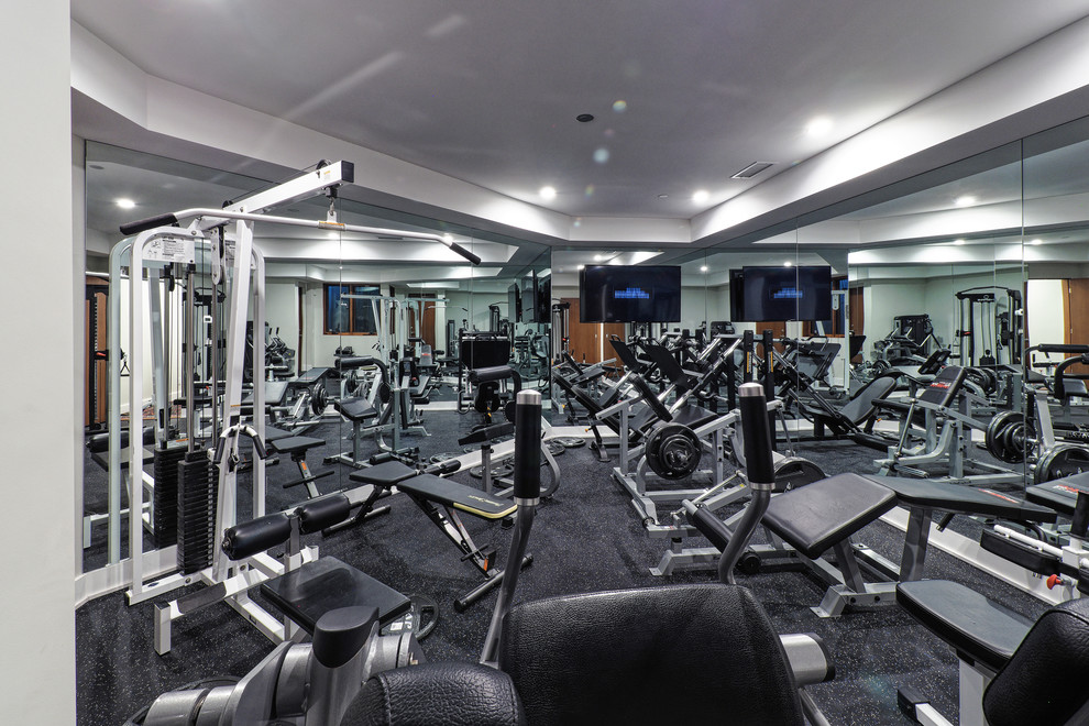 Inspiration for an expansive tropical home gym in Los Angeles.