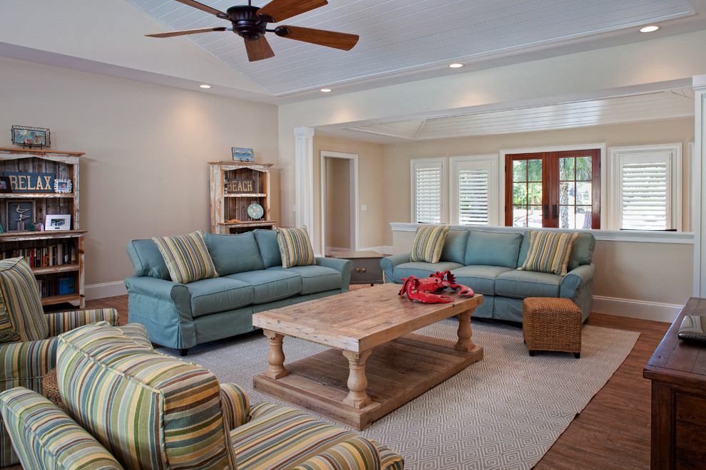 Photo of a beach style family room in Charleston.