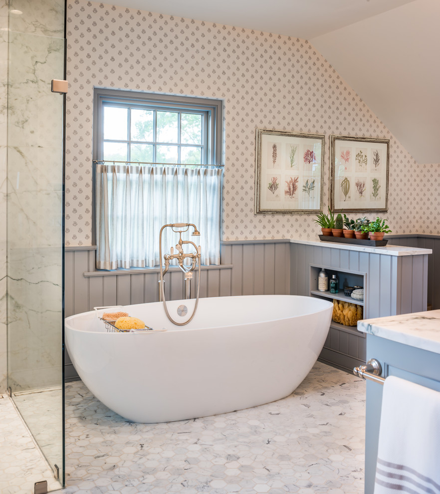 Photo of a large traditional master bathroom in Philadelphia with a freestanding tub, marble floors and multi-coloured walls.