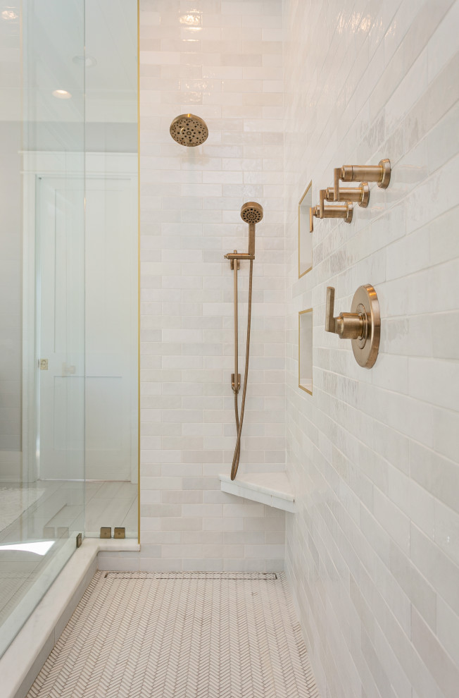 Inspiration for a medium sized coastal family bathroom in Charleston with shaker cabinets, blue cabinets, an alcove bath, a corner shower, a two-piece toilet, metro tiles, white walls, mosaic tile flooring, marble worktops, white floors, a shower curtain, white worktops, a single sink, a built in vanity unit and wallpapered walls.