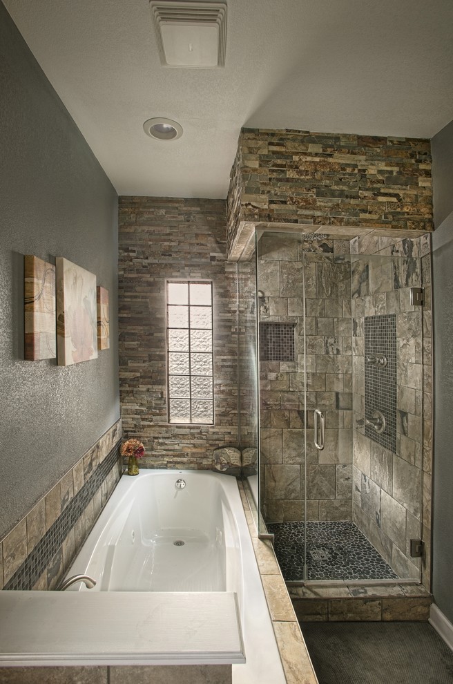Design ideas for a large country master bathroom in Wichita with recessed-panel cabinets, medium wood cabinets, a drop-in tub, a corner shower, a two-piece toilet, grey walls, ceramic floors, an integrated sink, granite benchtops and a hinged shower door.