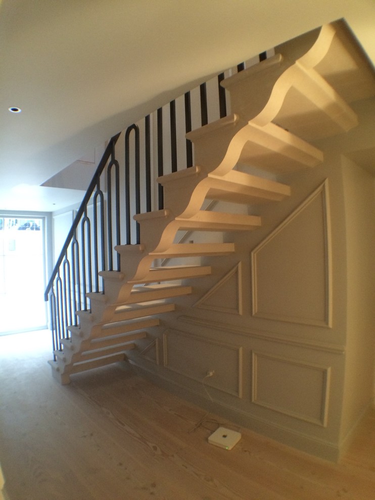 This is an example of a small traditional staircase in London.