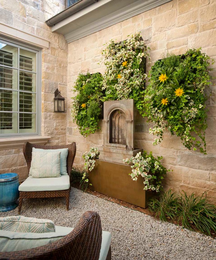 Design ideas for a traditional patio in Dallas with a vertical garden.
