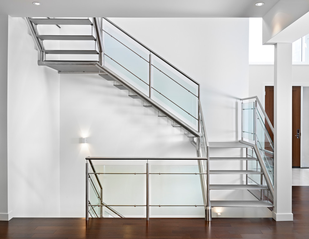 Inspiration for a modern staircase in Edmonton with open risers.