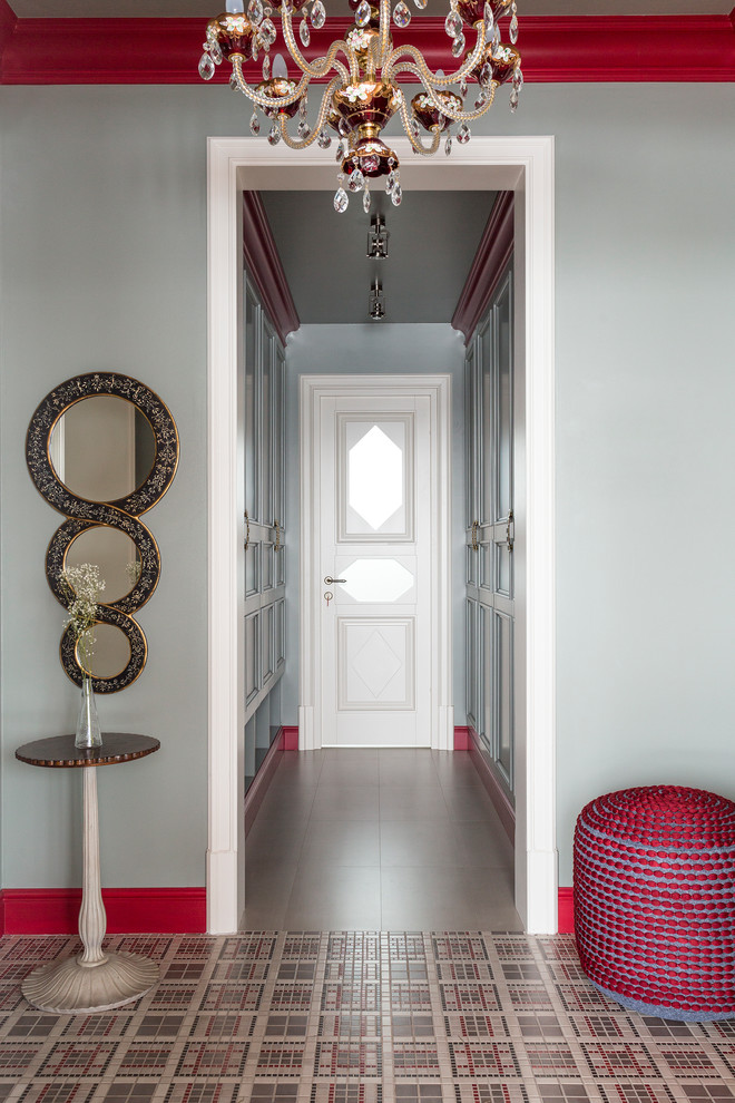 This is an example of an eclectic hallway in Moscow with grey walls.