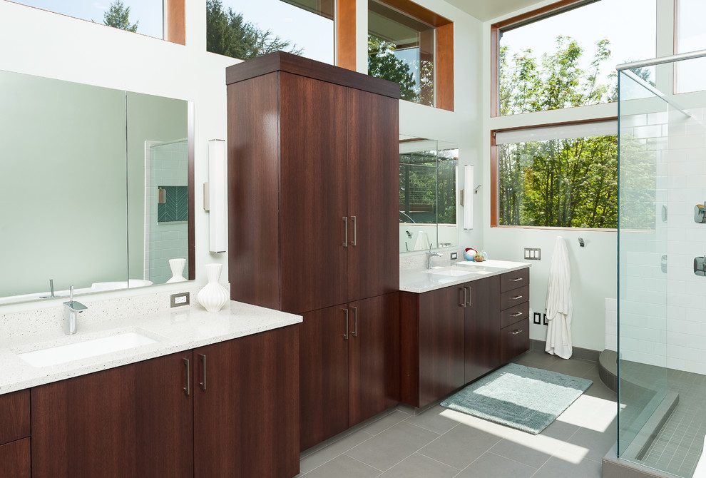 Design ideas for a midcentury master bathroom in Portland with flat-panel cabinets, dark wood cabinets, a freestanding tub, an open shower, a bidet, green tile, porcelain tile, green walls, porcelain floors, an undermount sink, quartzite benchtops, grey floor, an open shower, white benchtops, a niche, a double vanity, a built-in vanity and vaulted.
