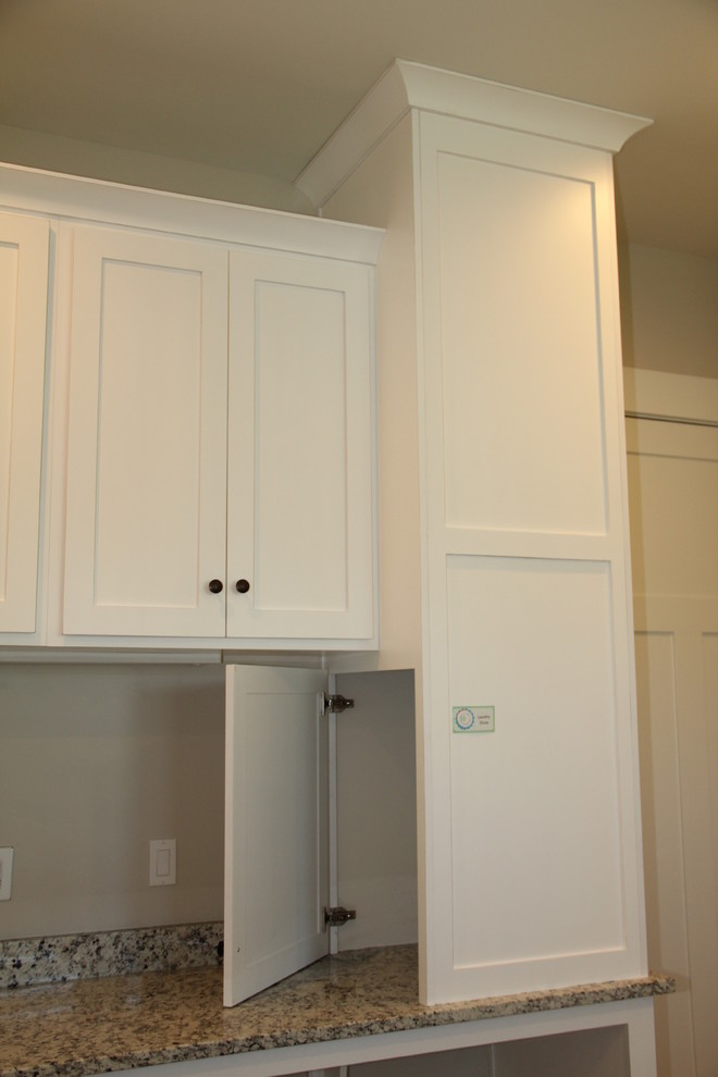 Design ideas for a transitional laundry room in Salt Lake City.