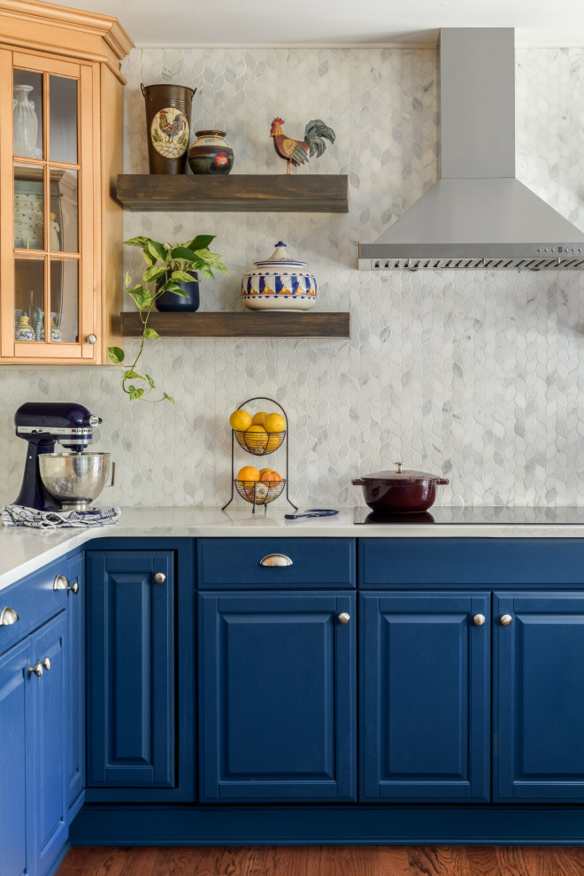 Inspiration for a mid-sized traditional u-shaped kitchen in Philadelphia with raised-panel cabinets, blue cabinets, quartz benchtops, white splashback and white benchtop.