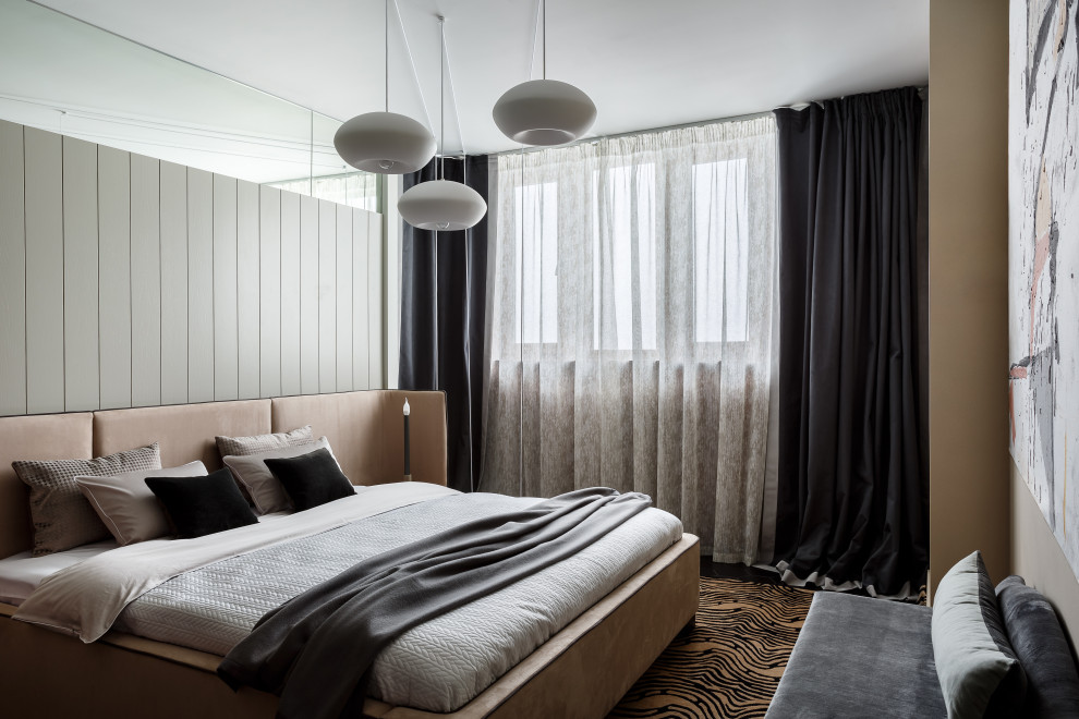 Photo of a contemporary bedroom in Moscow with beige walls.