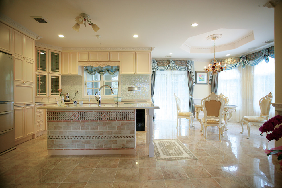 Traditional open plan kitchen in Other with recessed-panel cabinets, white cabinets, marble floors and with island.