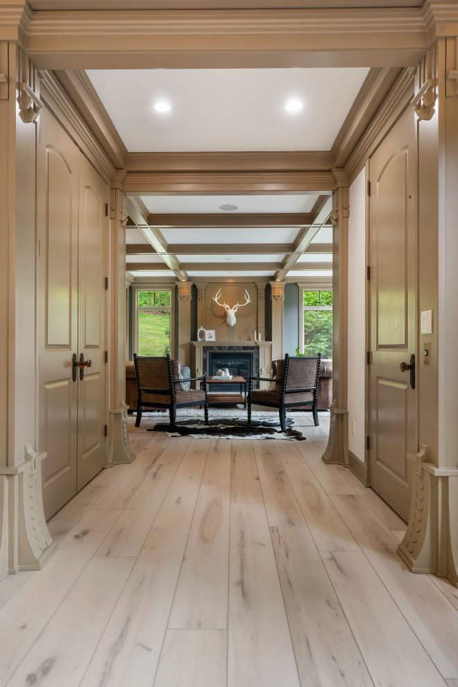 Design ideas for a large traditional enclosed games room in Seattle with a home bar, grey walls, vinyl flooring, a standard fireplace, a stone fireplace surround, beige floors and a coffered ceiling.