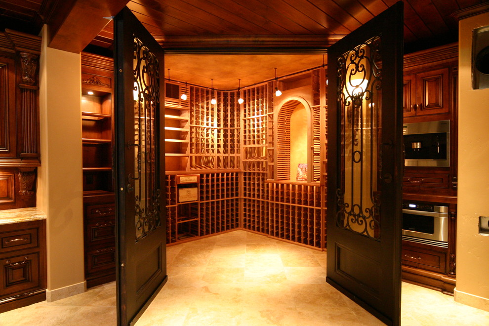 Inspiration for a mid-sized traditional wine cellar in Sacramento with ceramic floors, storage racks and grey floor.