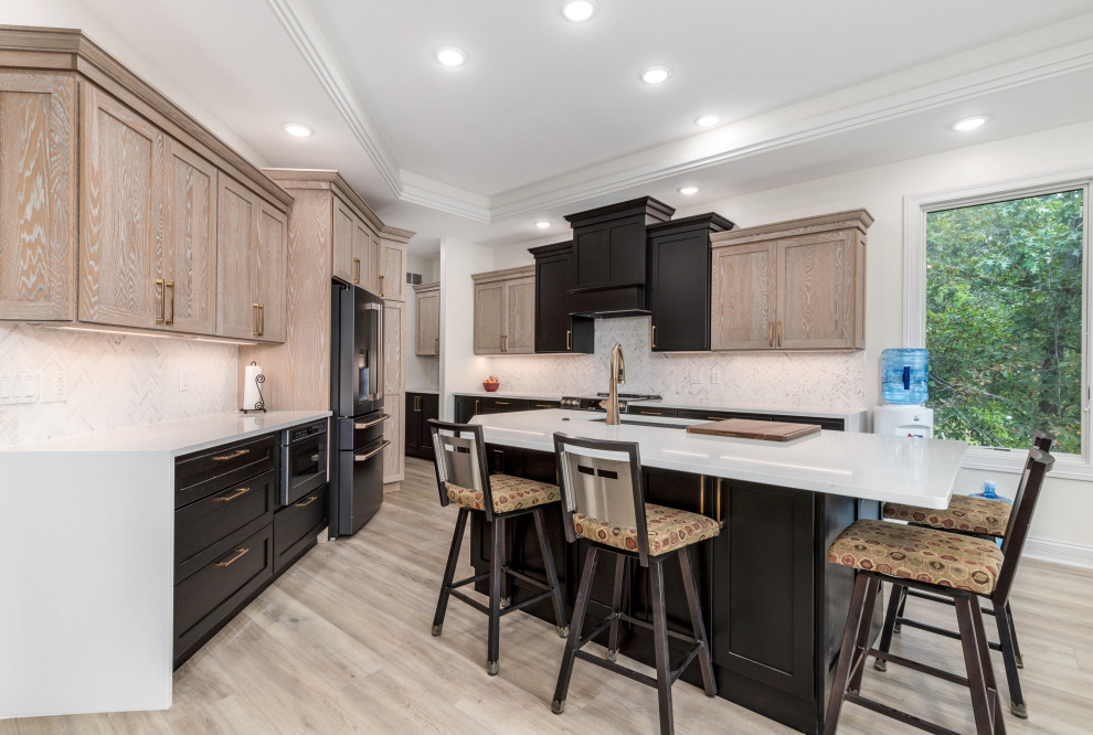 Modern Kitchen with Contrasting Cabinetry and Quartz Accents