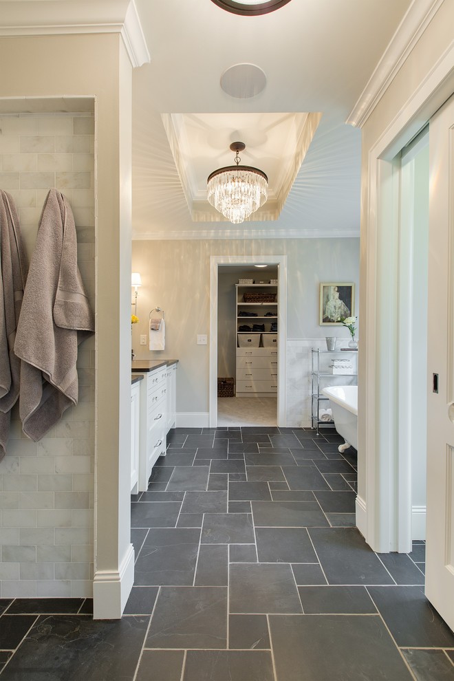 Inspiration for a large transitional master bathroom in Minneapolis with recessed-panel cabinets, white cabinets, a claw-foot tub, an open shower, beige tile, subway tile, beige walls, slate floors, an undermount sink and soapstone benchtops.
