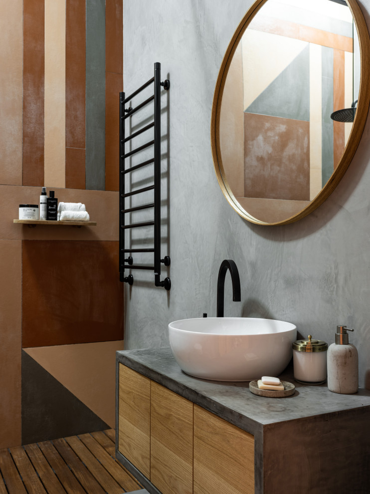 Inspiration för moderna grått badrum, med släta luckor och ett fristående handfat