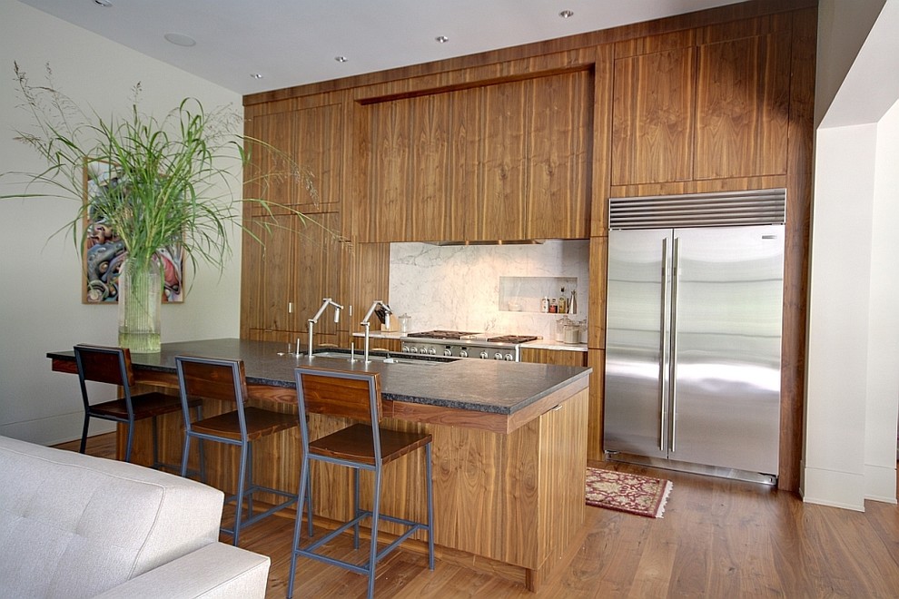 This is an example of a modern kitchen in Atlanta with stainless steel appliances.
