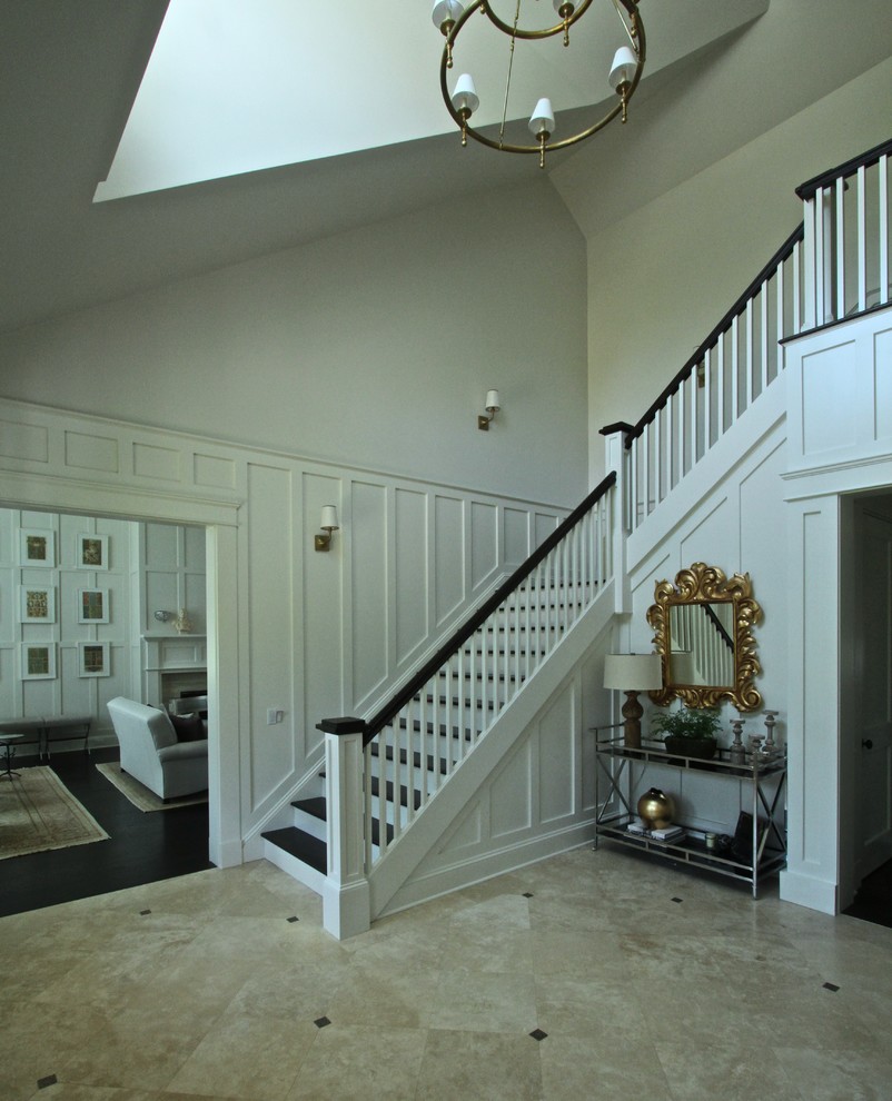 Design ideas for a large transitional wood l-shaped staircase in New York with painted wood risers and wood railing.