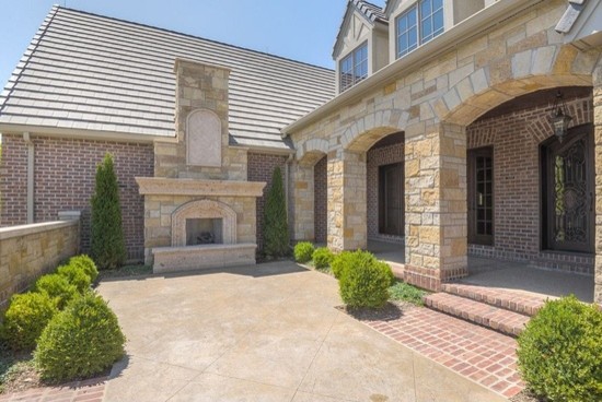 Inspiration for a huge transitional concrete floor front door remodel in Phoenix with beige walls and a glass front door