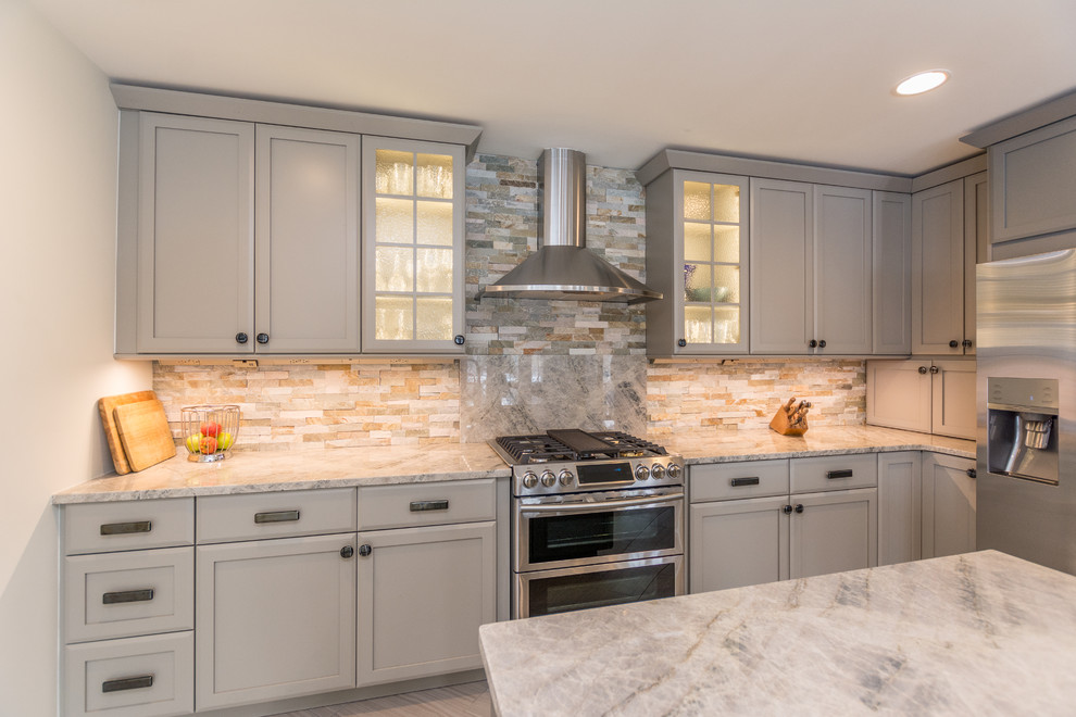 Inspiration for a large transitional l-shaped eat-in kitchen in Detroit with an undermount sink, shaker cabinets, grey cabinets, quartzite benchtops, multi-coloured splashback, slate splashback, stainless steel appliances, ceramic floors, with island, beige floor and multi-coloured benchtop.