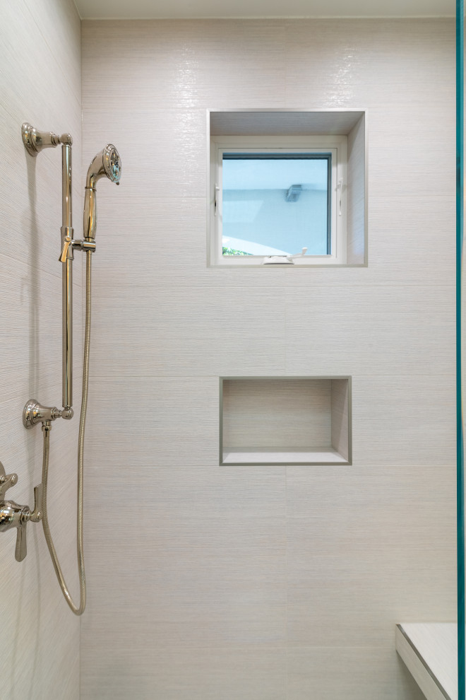This is an example of a large modern shower room bathroom in San Francisco with raised-panel cabinets, blue cabinets, a built-in shower, a one-piece toilet, grey tiles, porcelain tiles, yellow walls, porcelain flooring, a submerged sink, engineered stone worktops, grey floors, a hinged door, white worktops, a shower bench, a single sink and a built in vanity unit.