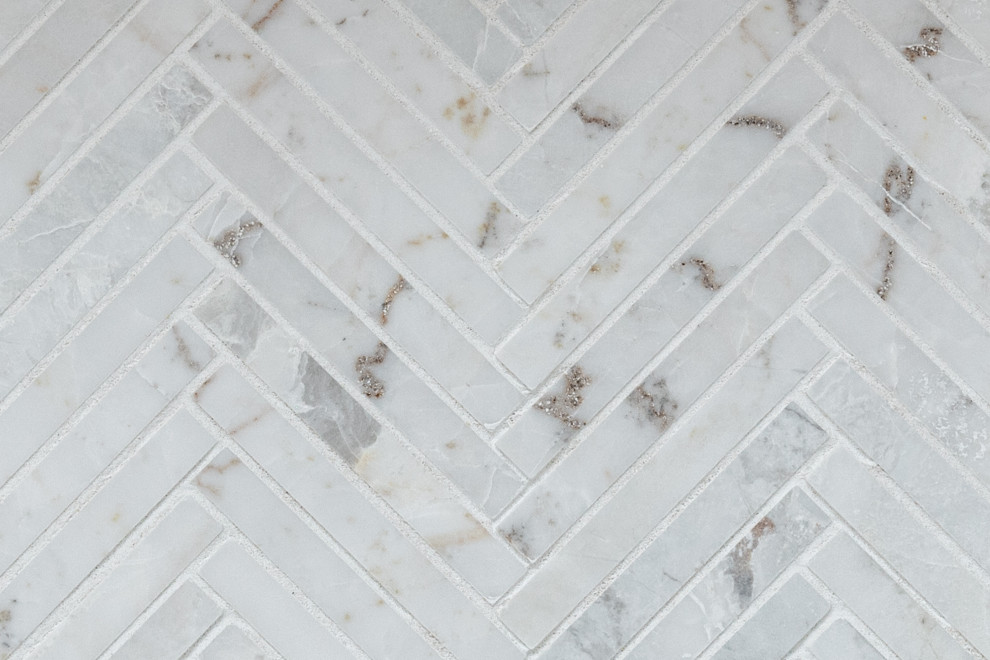 Herringbone Tile Backsplash for Added Texture and Elegance