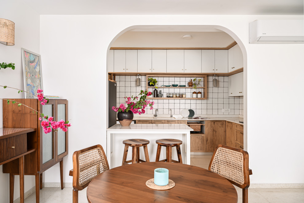 Photo of a transitional dining room in Bengaluru.