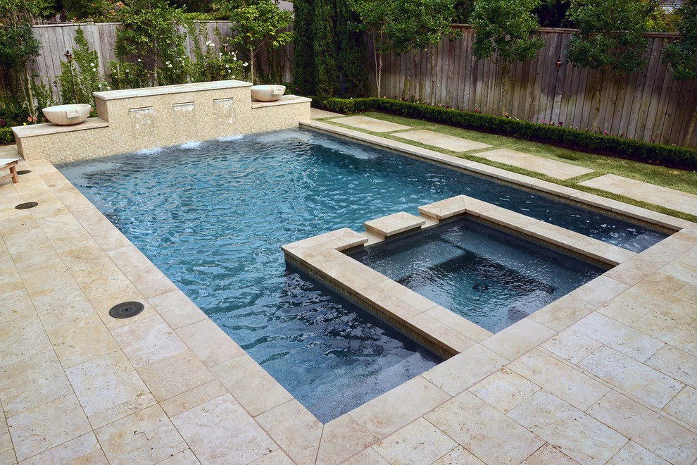 Example of a mid-sized transitional backyard rectangular and tile pool fountain design in Houston