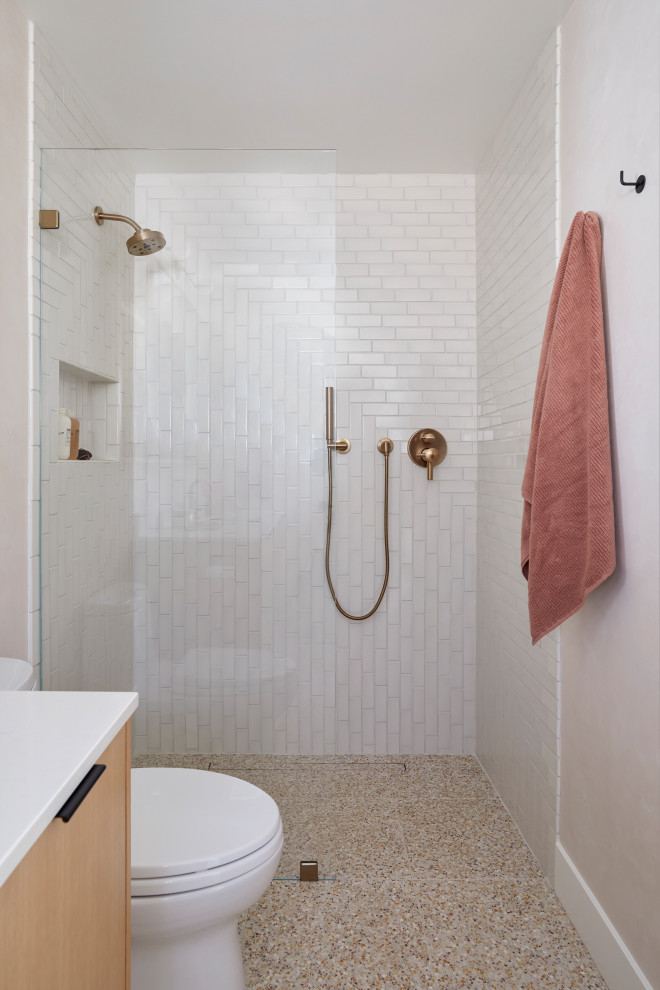 Small scandinavian master bathroom in San Francisco with flat-panel cabinets, brown cabinets, a curbless shower, white tile, ceramic tile, pink walls, terrazzo floors, an undermount sink, engineered quartz benchtops, pink floor, an open shower, white benchtops, a niche, a single vanity and a floating vanity.