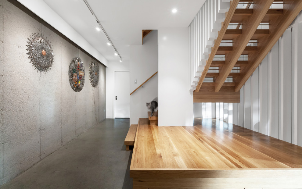 Staircase - mid-sized scandinavian wooden l-shaped open, wood railing and wood wall staircase idea in Indianapolis