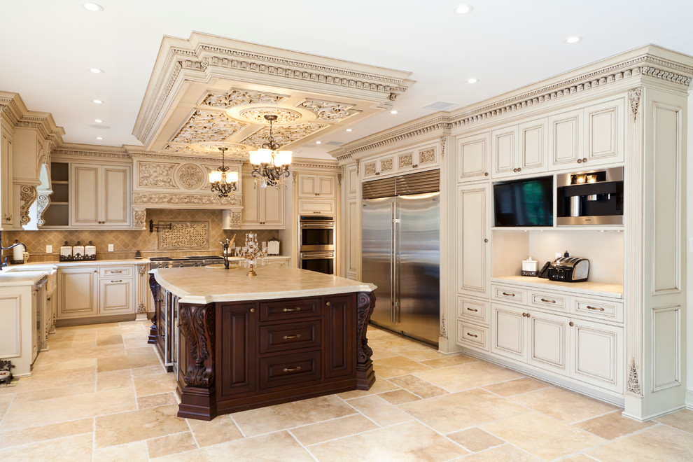 Photo of a mid-sized traditional u-shaped separate kitchen in New York with a farmhouse sink, raised-panel cabinets, beige cabinets, marble benchtops, beige splashback, ceramic splashback, stainless steel appliances, ceramic floors, with island, beige floor and beige benchtop.