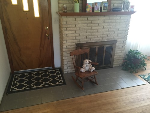 Flooring suggestions for front door/fireplace combo Help! We moved into our 1960