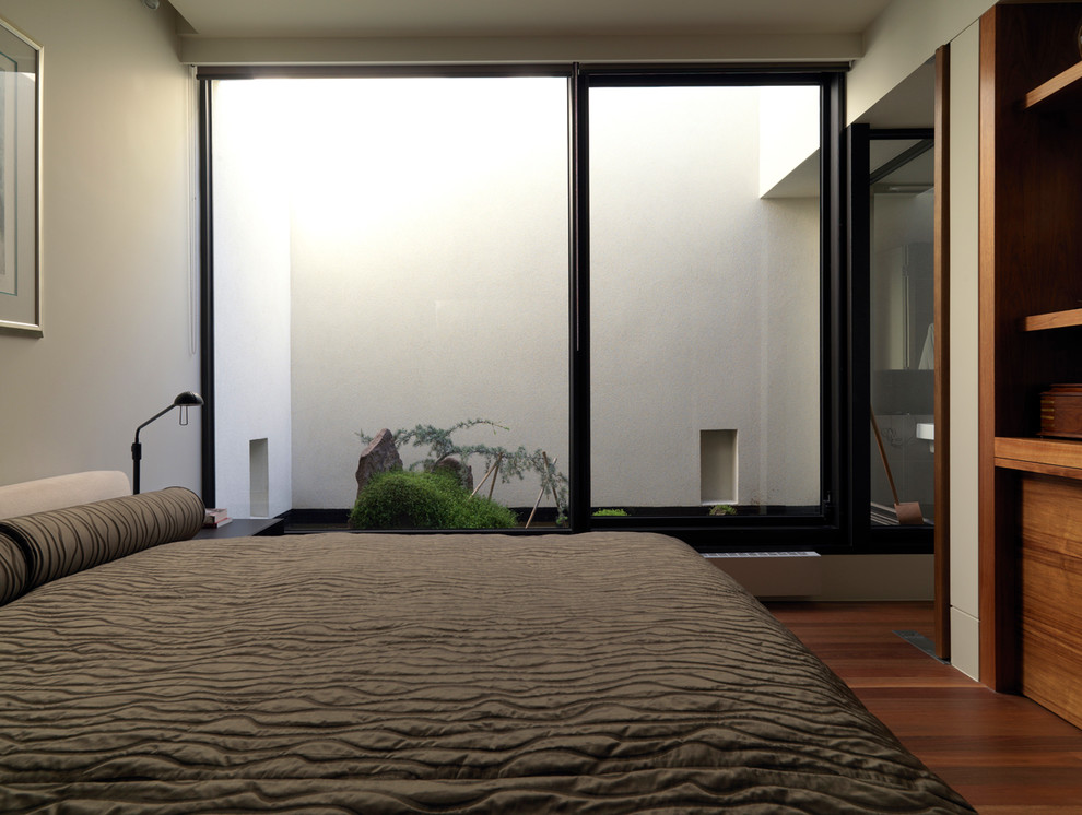 Photo of a small modern bedroom in Melbourne.