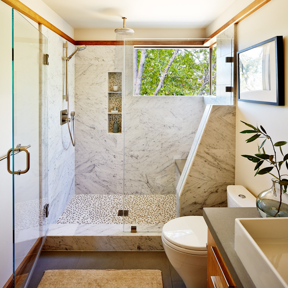Inspiration for a contemporary bathroom in San Francisco with a vessel sink, medium wood cabinets, an alcove shower, white tile and beige walls.