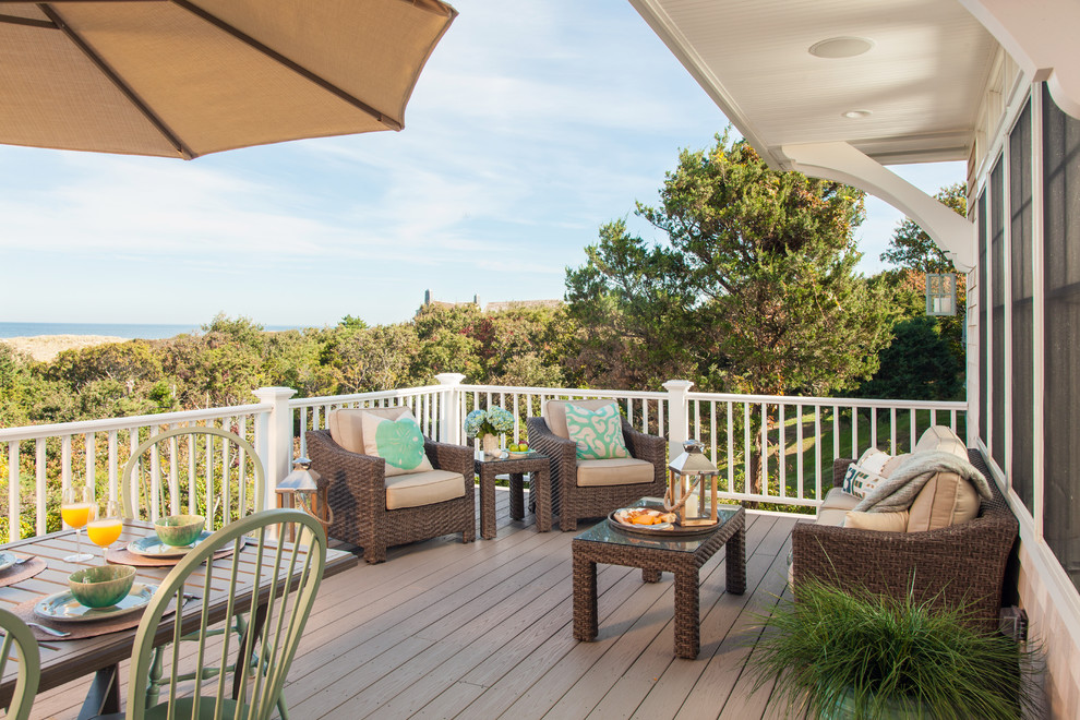 Deck - mid-sized coastal backyard deck idea in Boston with an awning