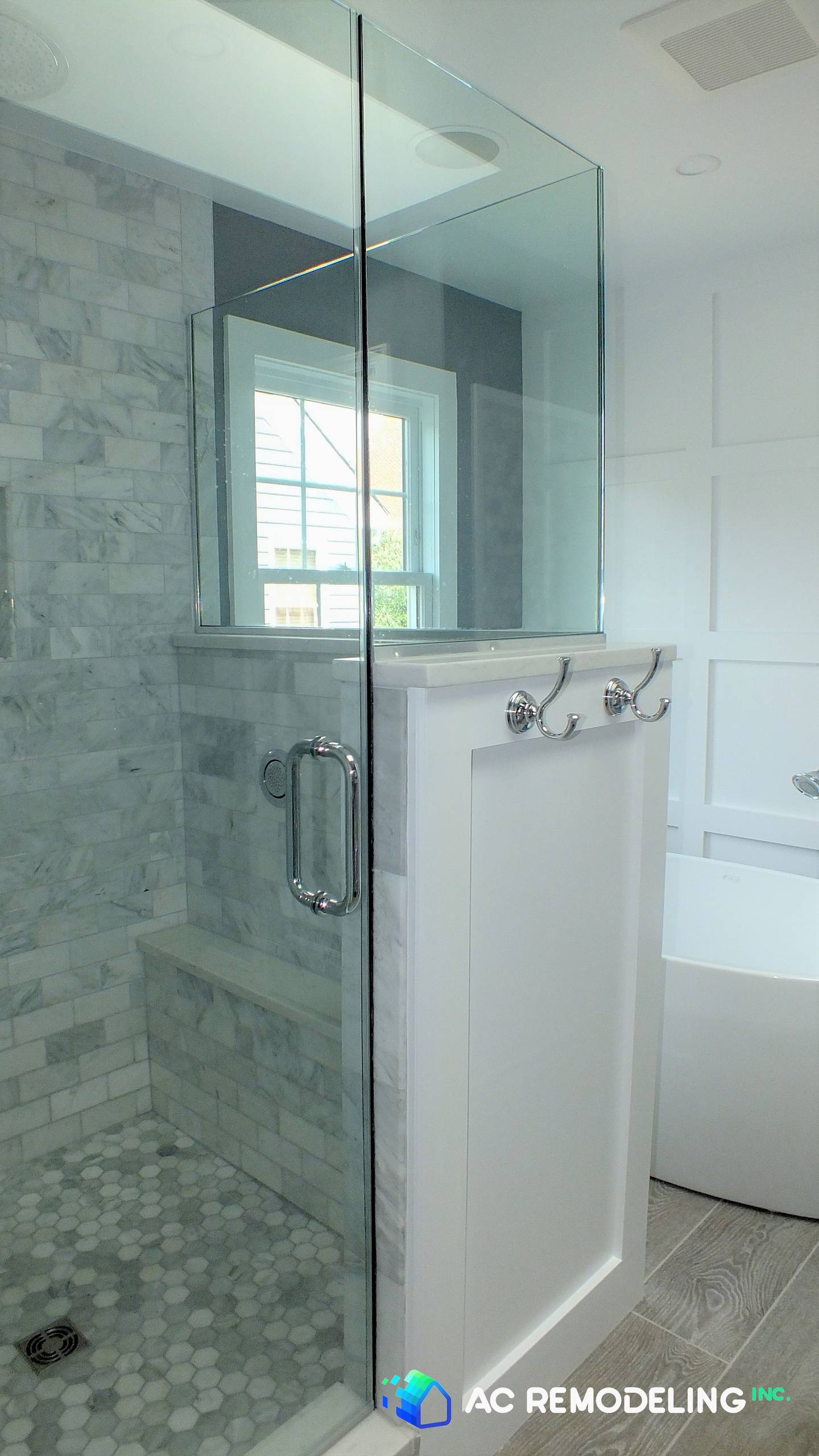 Walk-in shower and freestanding tub.